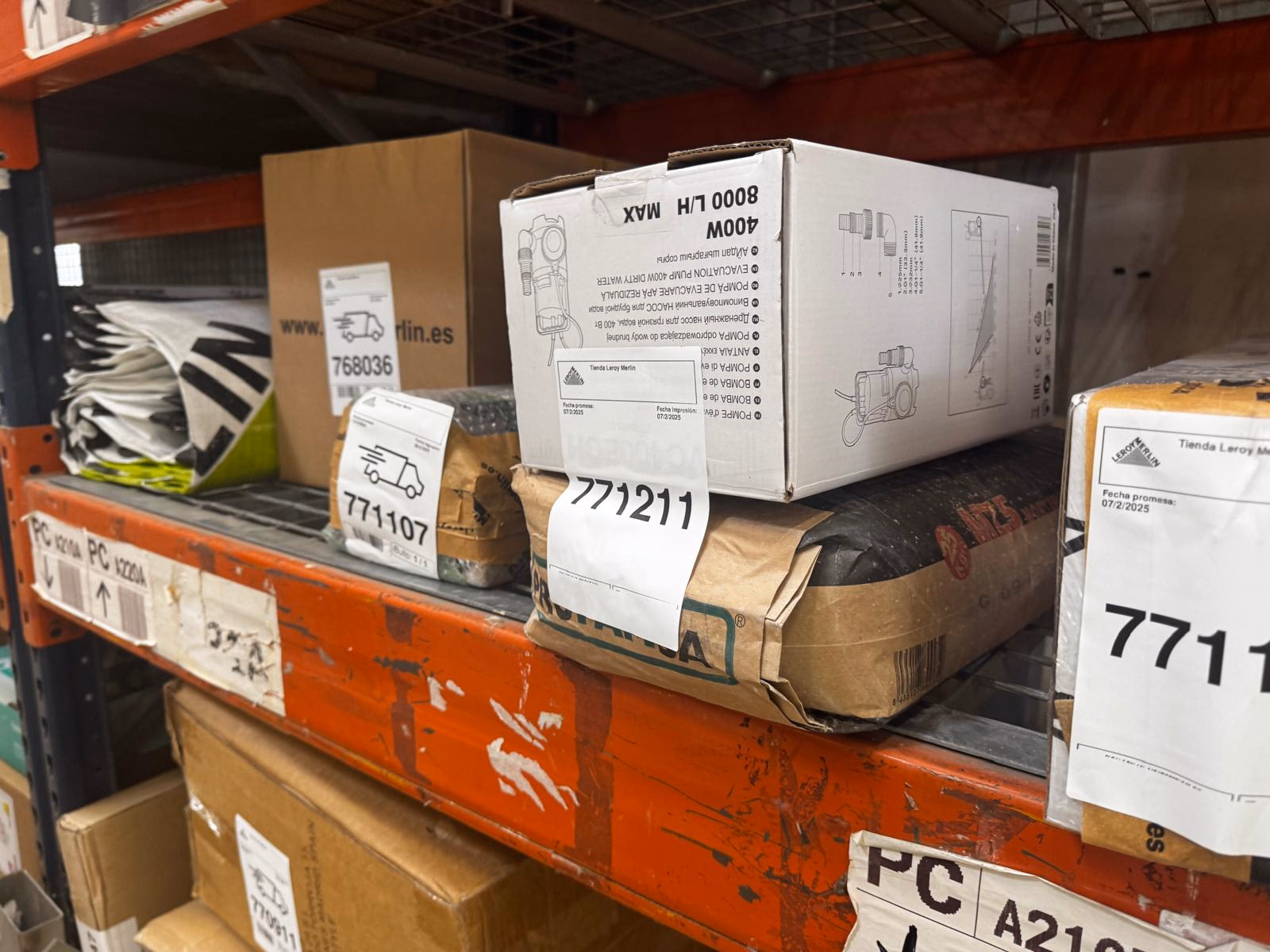 A delivery handover scene showing stacked cardboard boxes and a customer receiving a kitchen order, representing the connected service across channels.